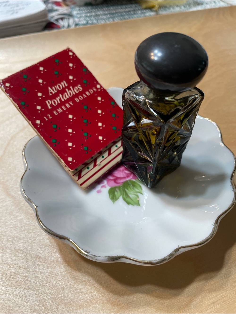 White bowl with roses in center made in Japan small enough for rings. Perfume